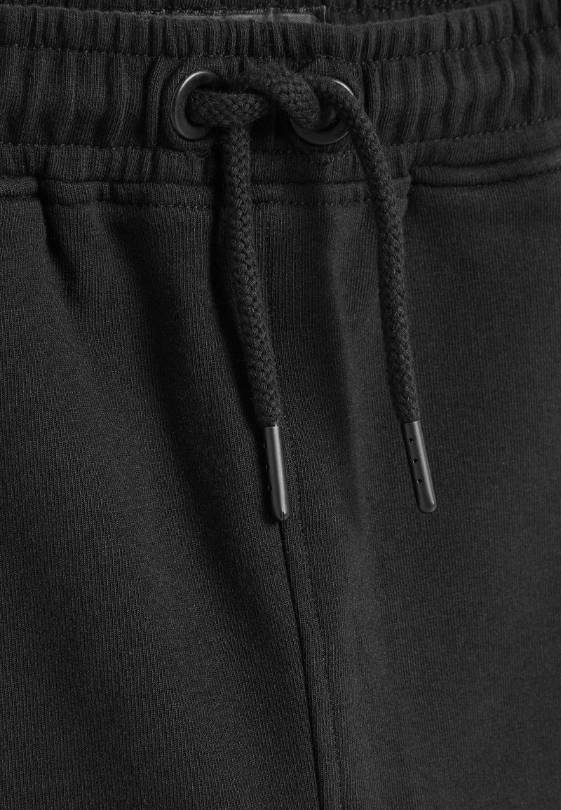 Next Kinder SPRAY ON - Jogginghose - Black 3 Next Kinder SPRAY ON - Jogginghose - Black – Bild 3