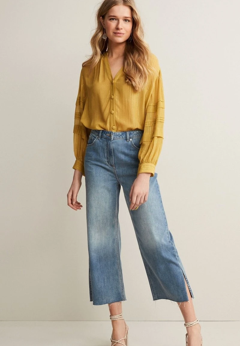 Next Damen SOFT SPLIT HEM CROPPED - Flared Jeans - Mid Blue 1 Next Damen SOFT SPLIT HEM CROPPED - Flared Jeans - Mid Blue
